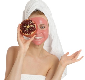 Photo of Young woman with pomegranate face mask and fresh fruit on white background