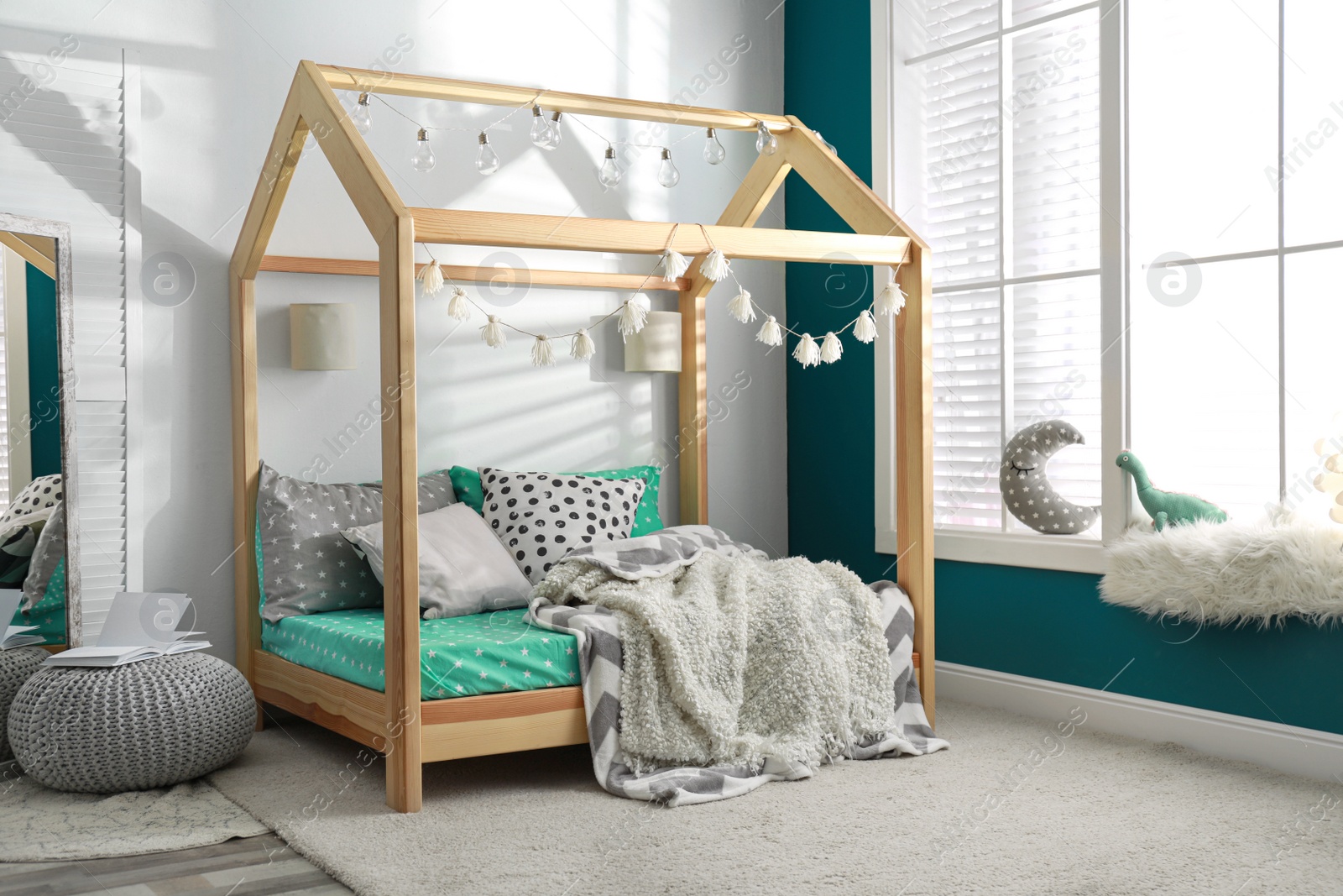 Photo of Cozy child room interior with comfortable bed