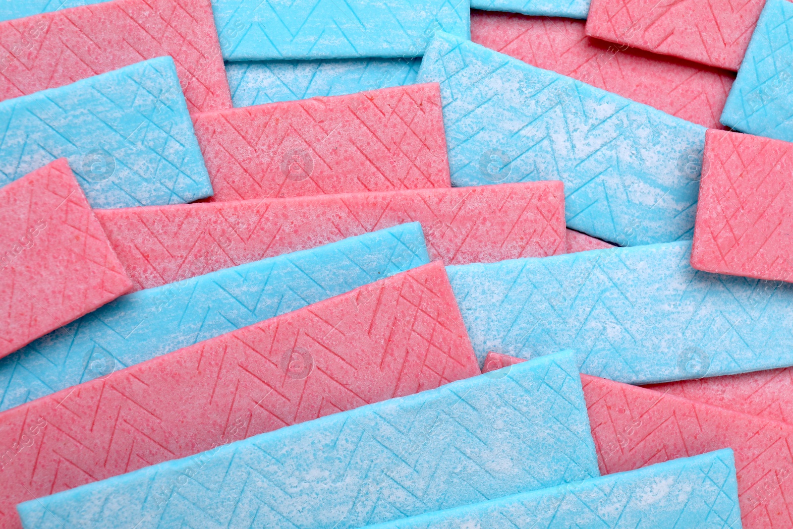 Photo of Sticks of tasty chewing gum as background, top view