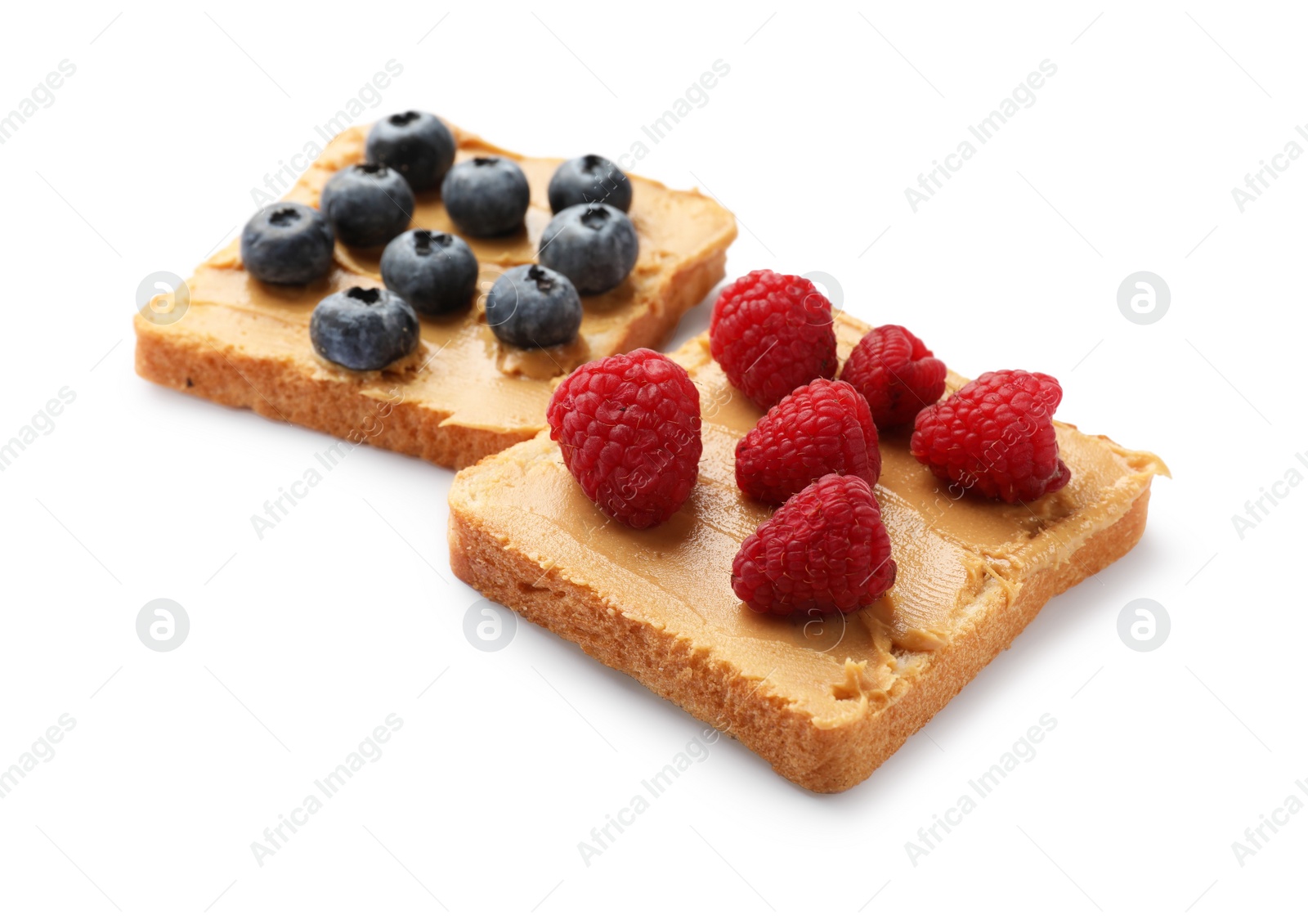 Photo of Tasty peanut butter sandwiches with fresh berries on white background