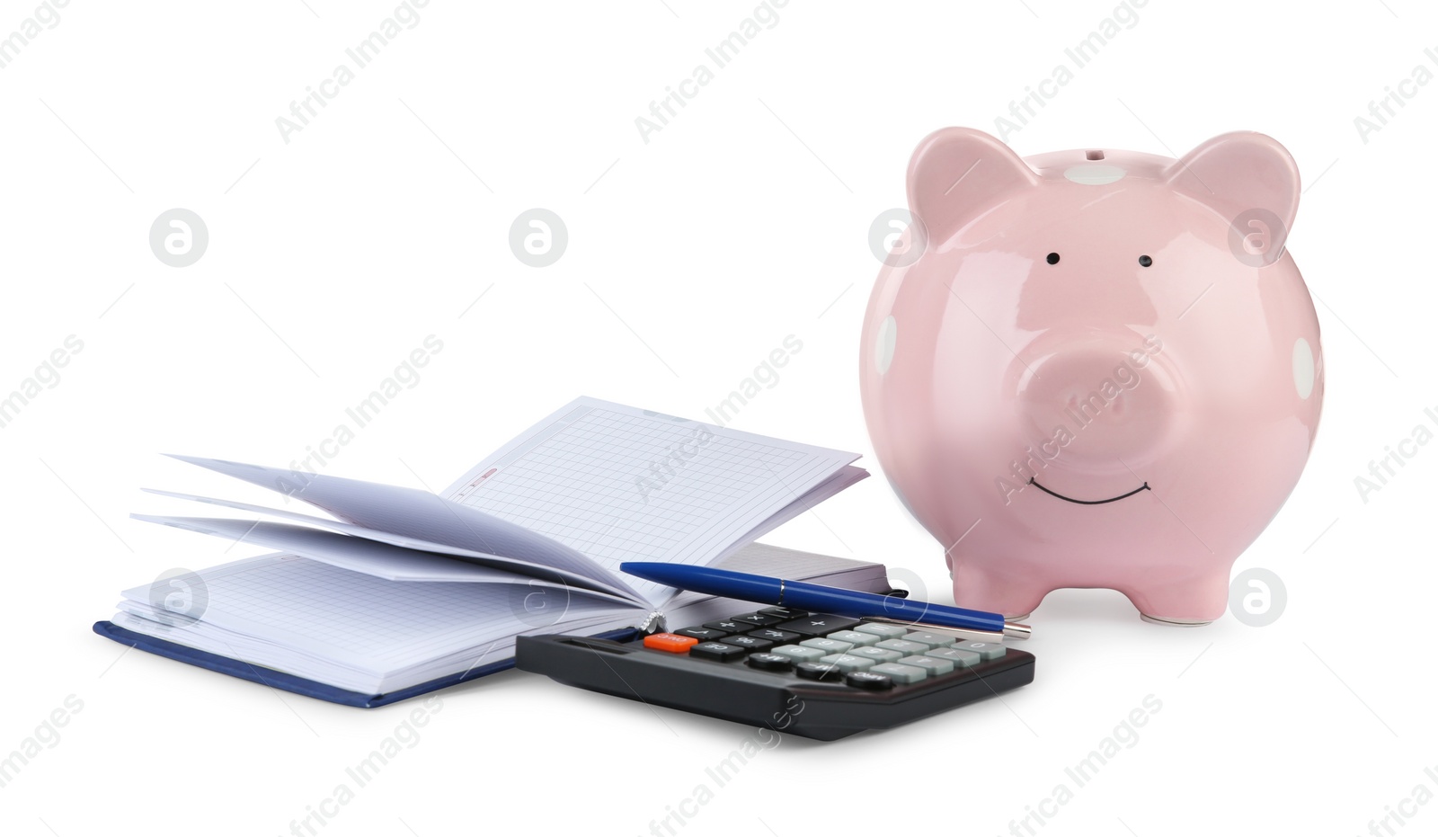 Photo of Calculator, pink piggy bank, notebook and pen isolated on white