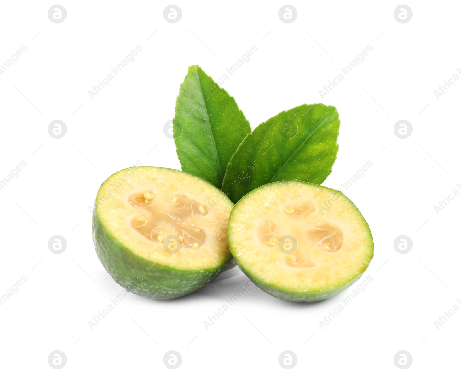 Photo of Cut feijoa and leaves on white background