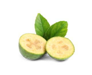 Photo of Cut feijoa and leaves on white background
