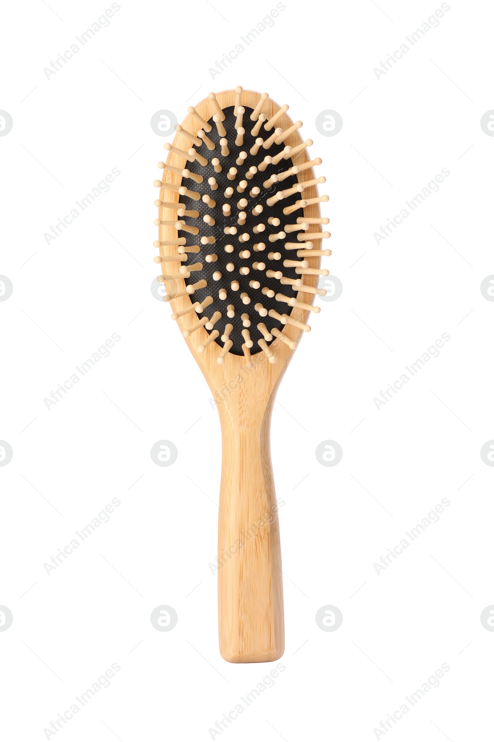 Photo of One new wooden hairbrush isolated on white