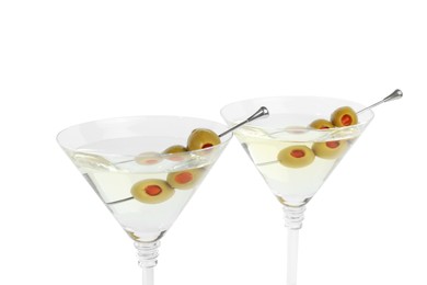 Photo of Martini cocktail with olives on white background