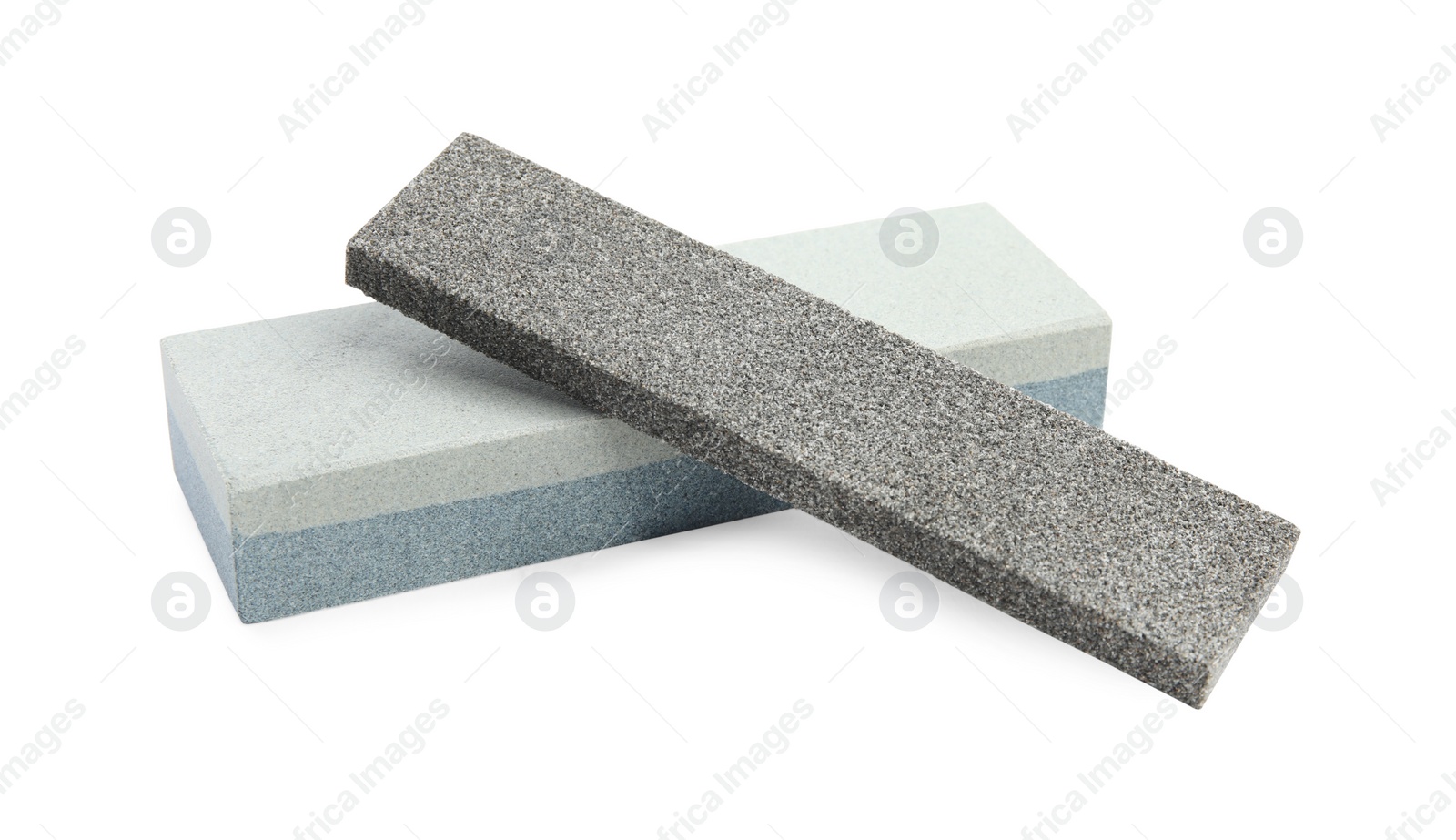 Photo of Sharpening stones for knife on white background