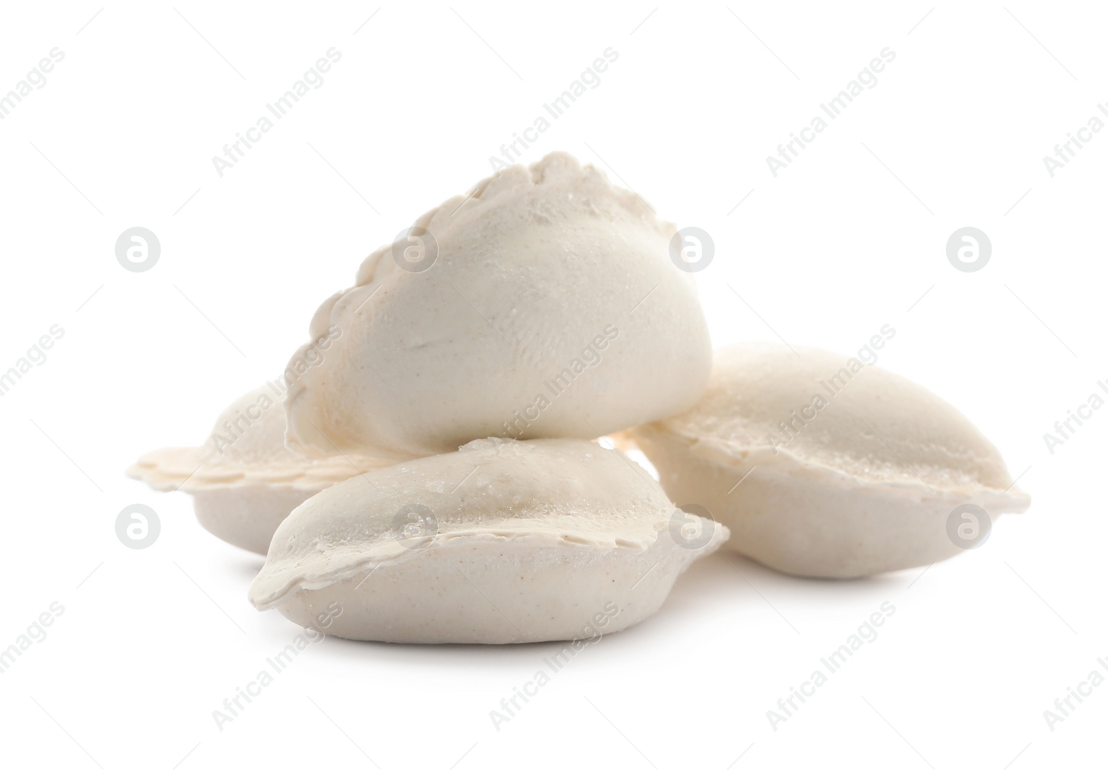 Photo of Heap of raw dumplings on white background