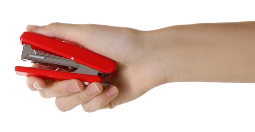 Woman holding red stapler on white background, closeup