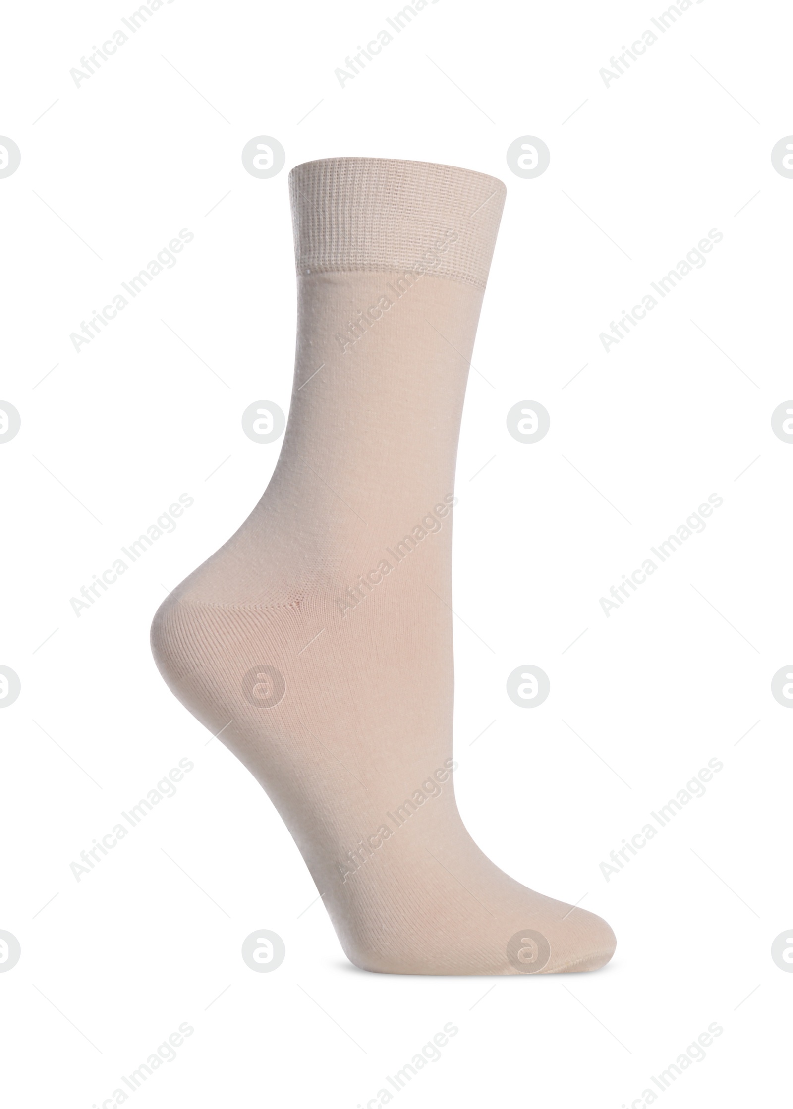 Photo of Beige sock isolated on white. Footwear accessory