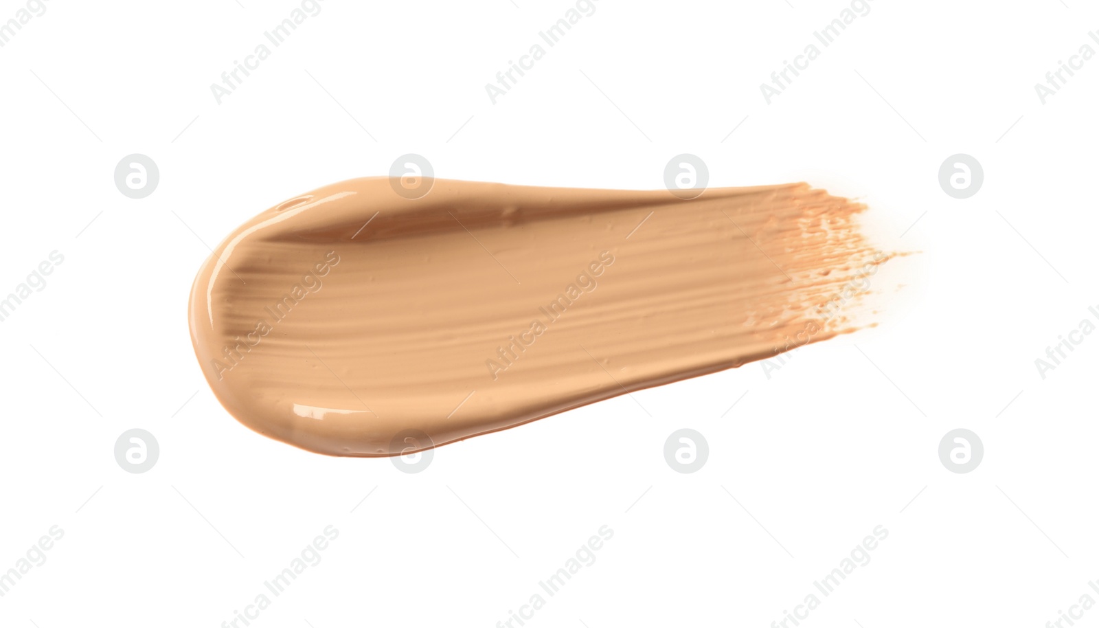 Photo of Smear of liquid skin foundation isolated on white, top view