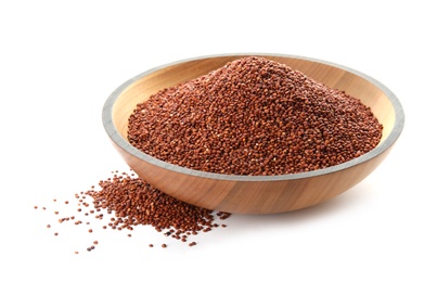 Bowl with red quinoa on white background