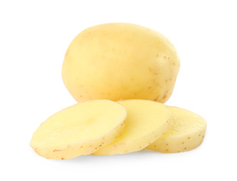 Photo of Whole and cut fresh raw organic potatoes on white background