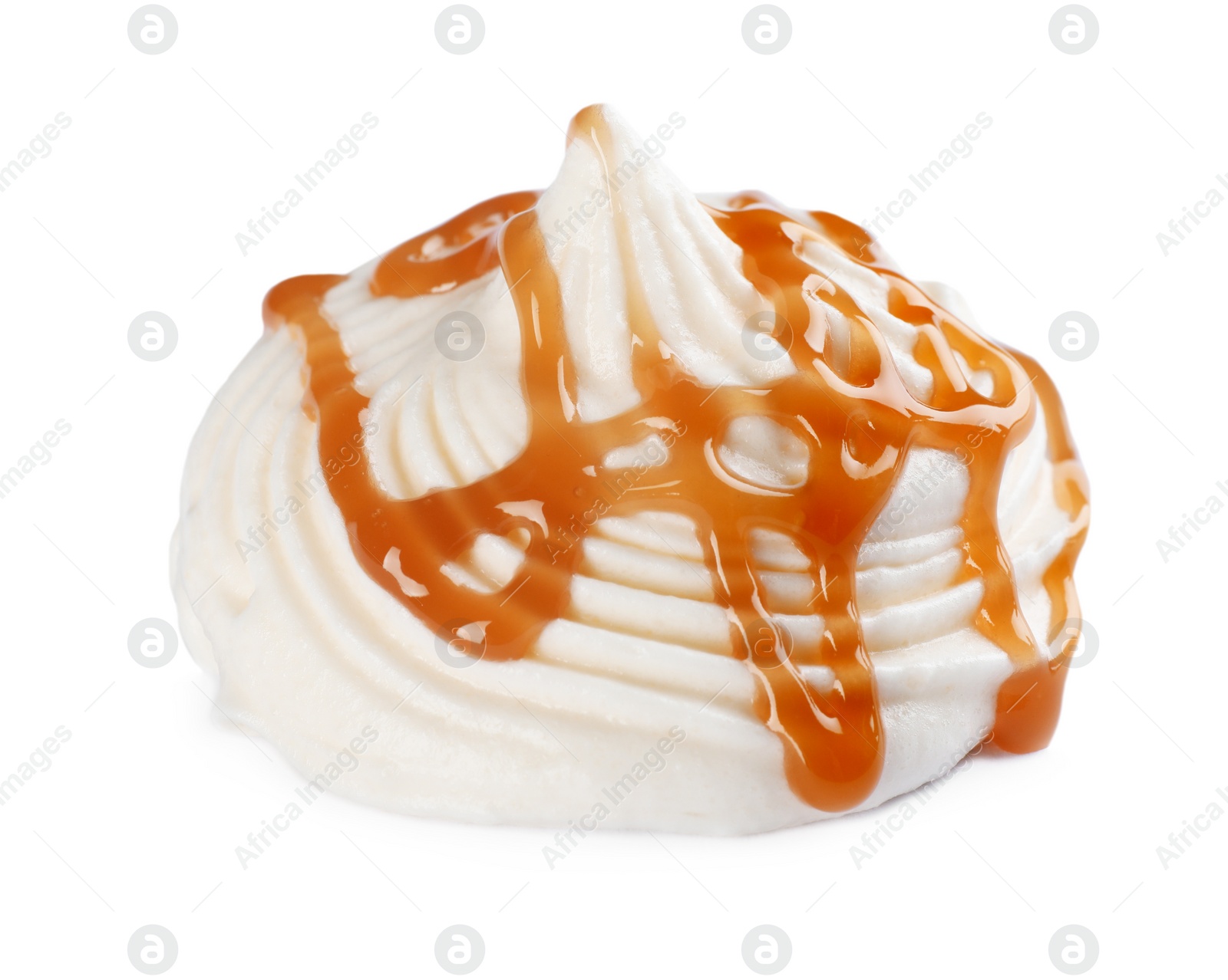 Photo of Whipped cream swirl with caramel sauce isolated on white background