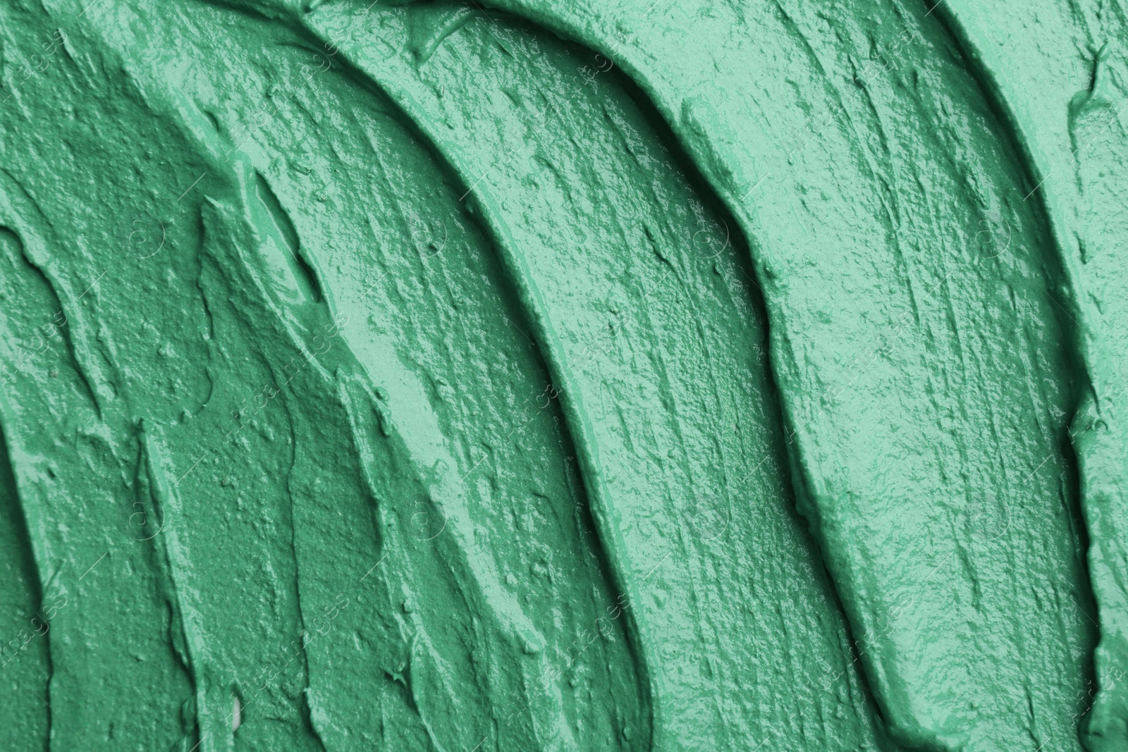 Photo of Natural spirulina facial mask as background, closeup