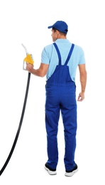 Photo of Gas station worker with fuel nozzle on white background, back view