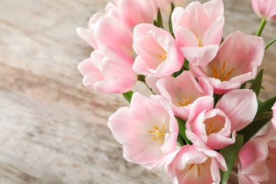 Beautiful tulips for Mother's Day on table, closeup