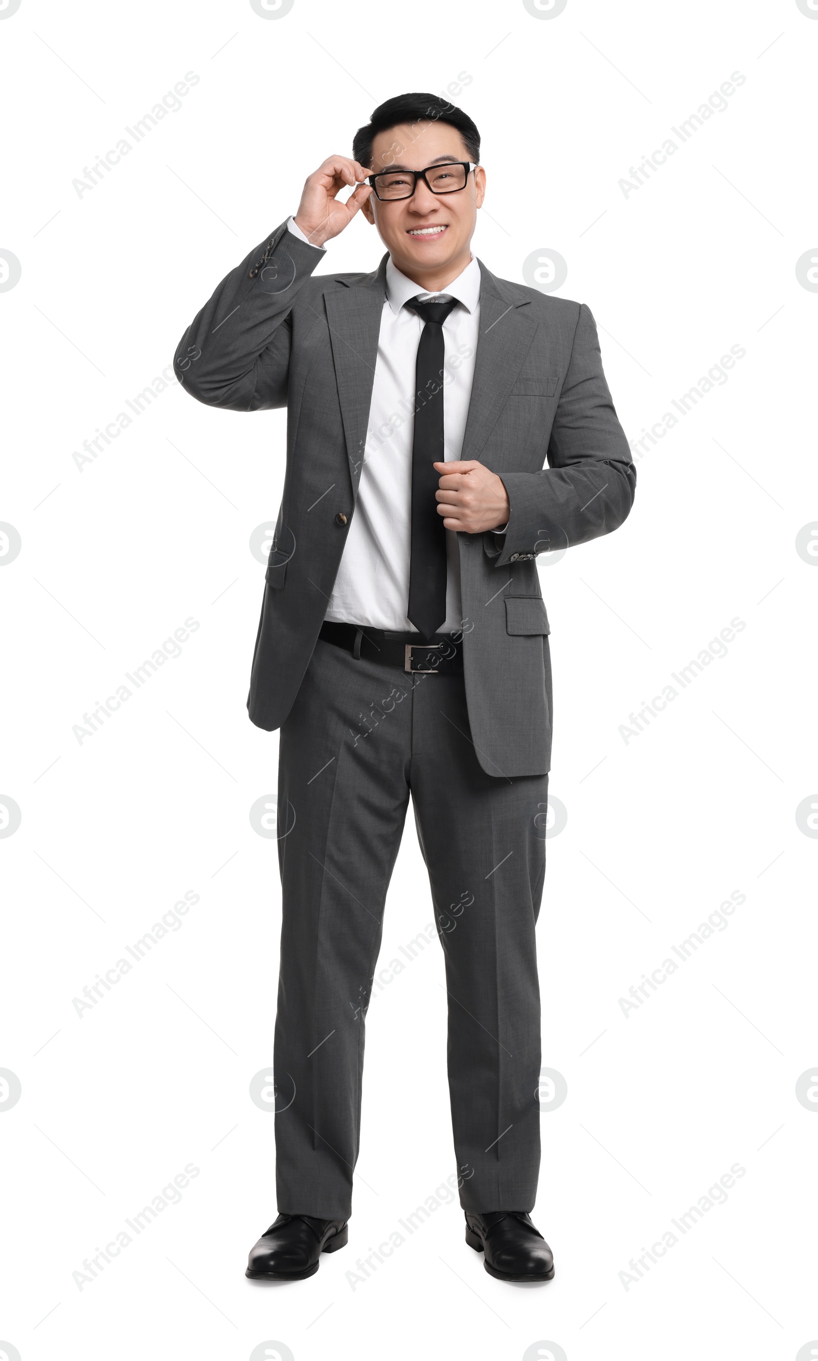 Photo of Businessman in suit wearing glasses on white background