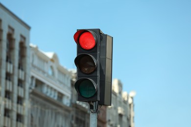Photo of View of traffic light against blue sky