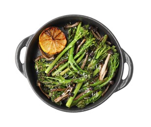 Tasty cooked broccolini, mushrooms and lemon isolated on white, top view