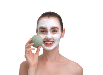 Happy young woman with face mask and sponge on white background