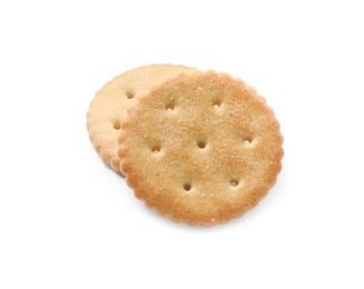 Photo of Two crispy crackers isolated on white. Delicious snack