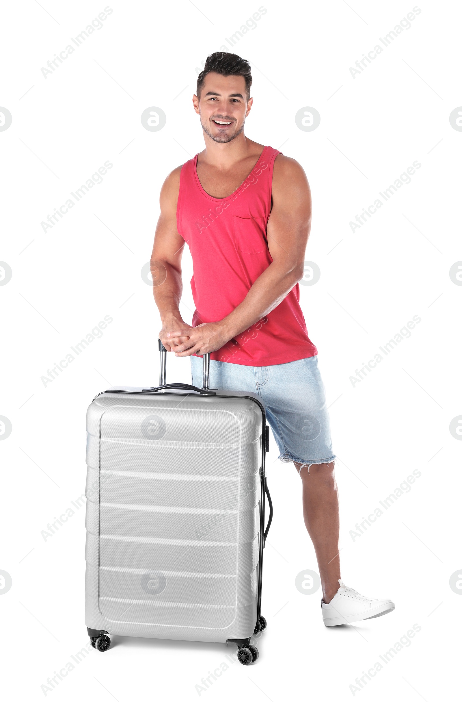 Photo of Young man with suitcase on white background