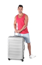 Photo of Young man with suitcase on white background