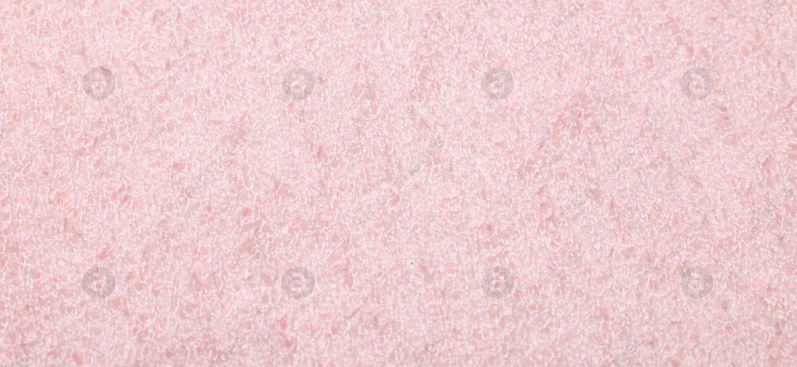 Photo of Texture of soft pink fabric as background, top view