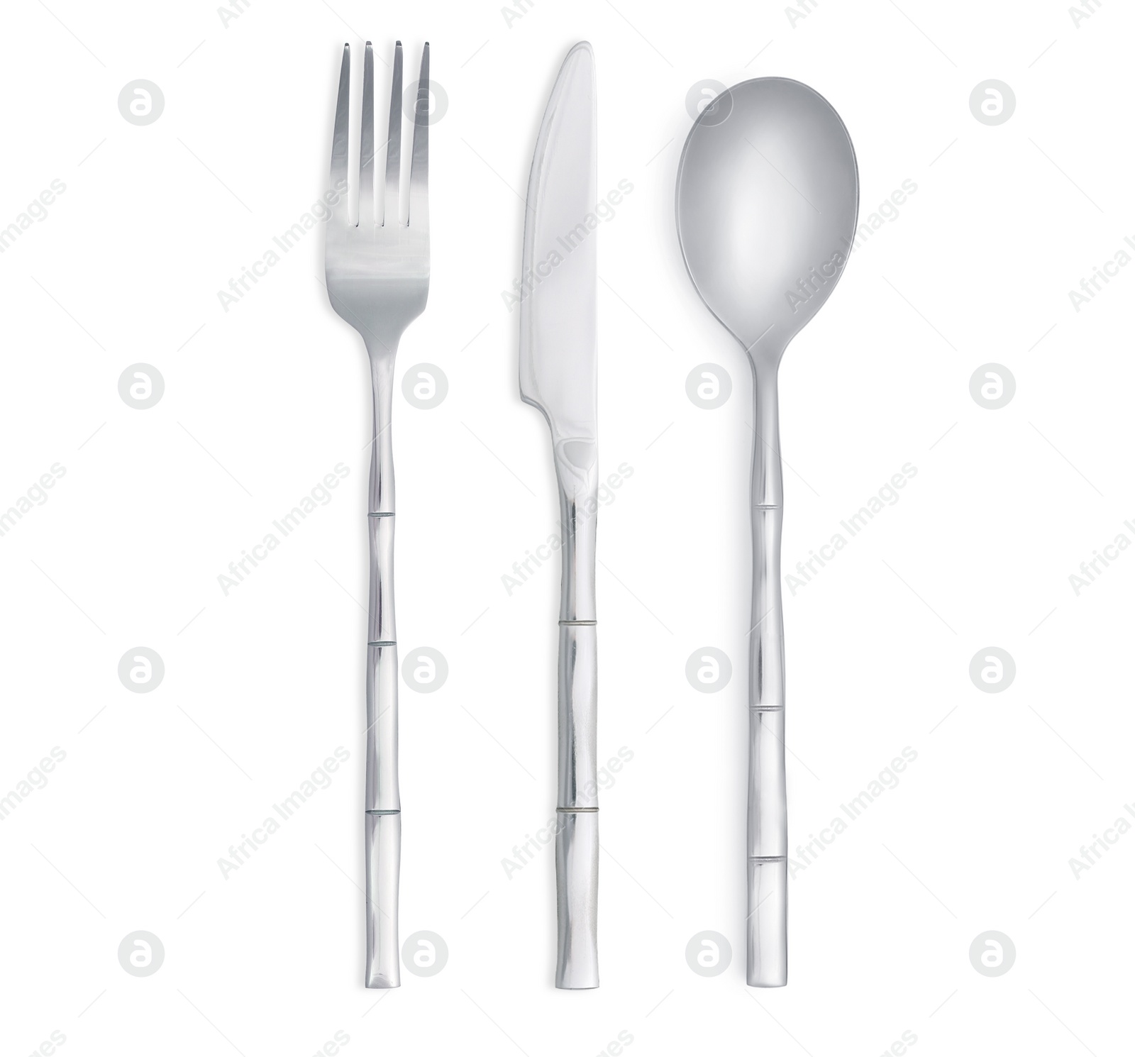 Image of Shiny silver cutlery set on white background, top view