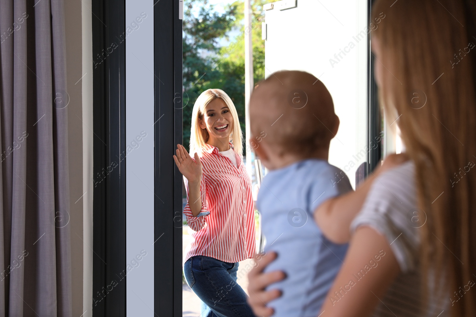 Photo of Mother leaving her baby with teen nanny at home