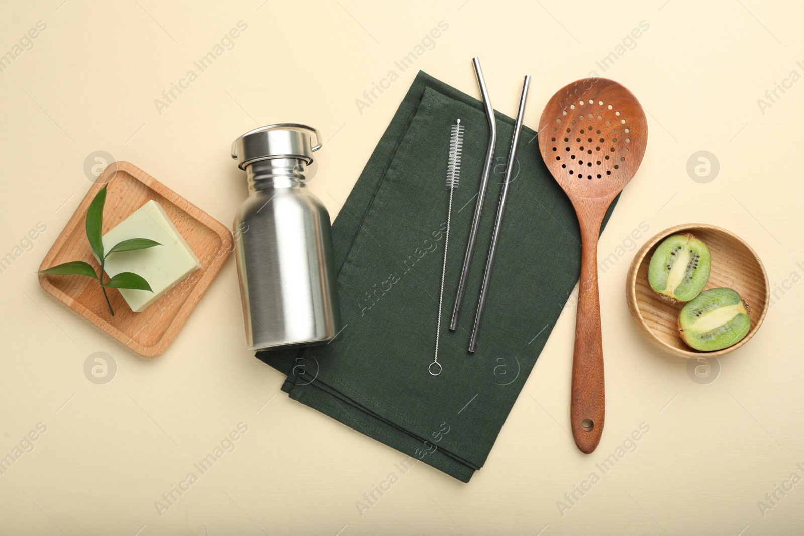 Photo of Flat lay composition with eco friendly products on beige background