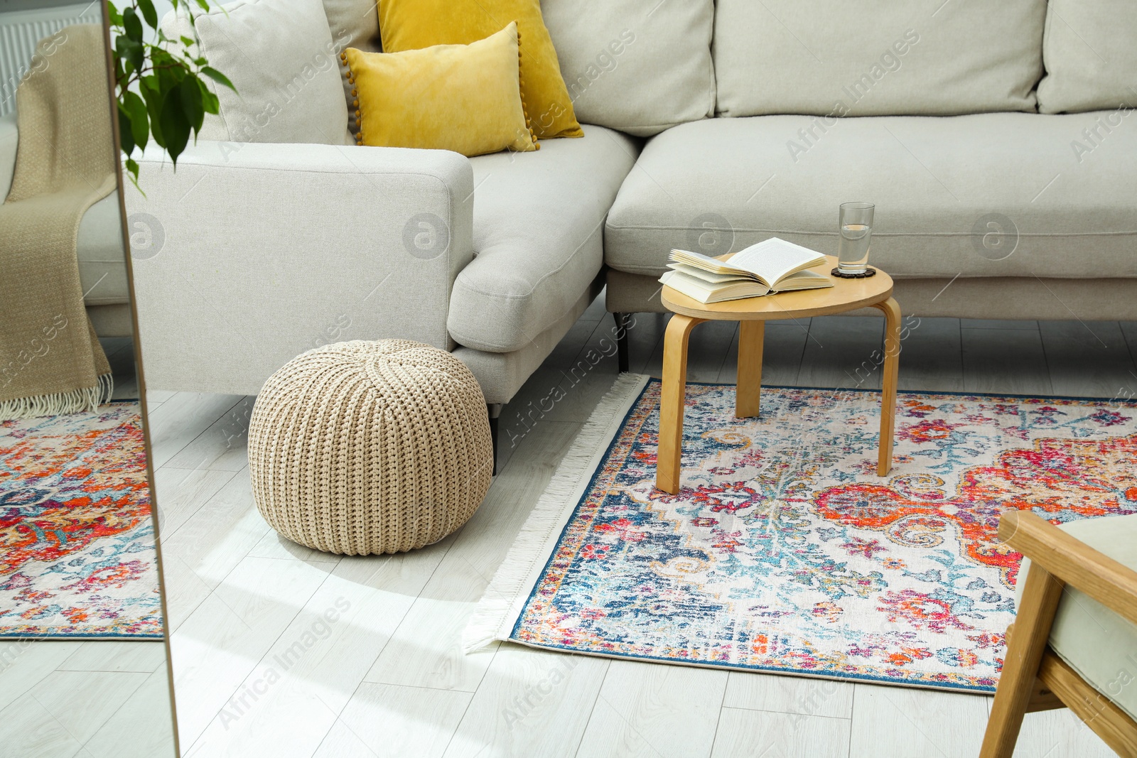 Photo of Stylish living room with beautiful carpet and furniture. Interior design