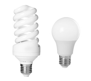 Image of Comparison of two different light bulbs on white background, collage