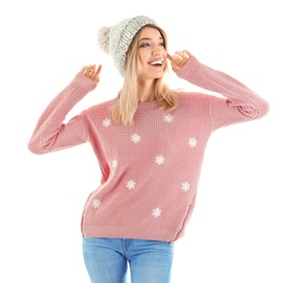 Photo of Portrait of happy young woman in warm clothing on white background. Ready for winter vacation