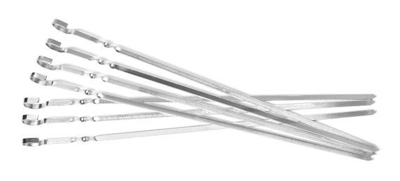 Photo of Metal skewers on white background, top view. Barbecue utensil