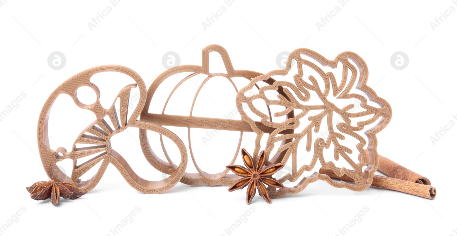 Photo of Different cookie cutters and spices on white background