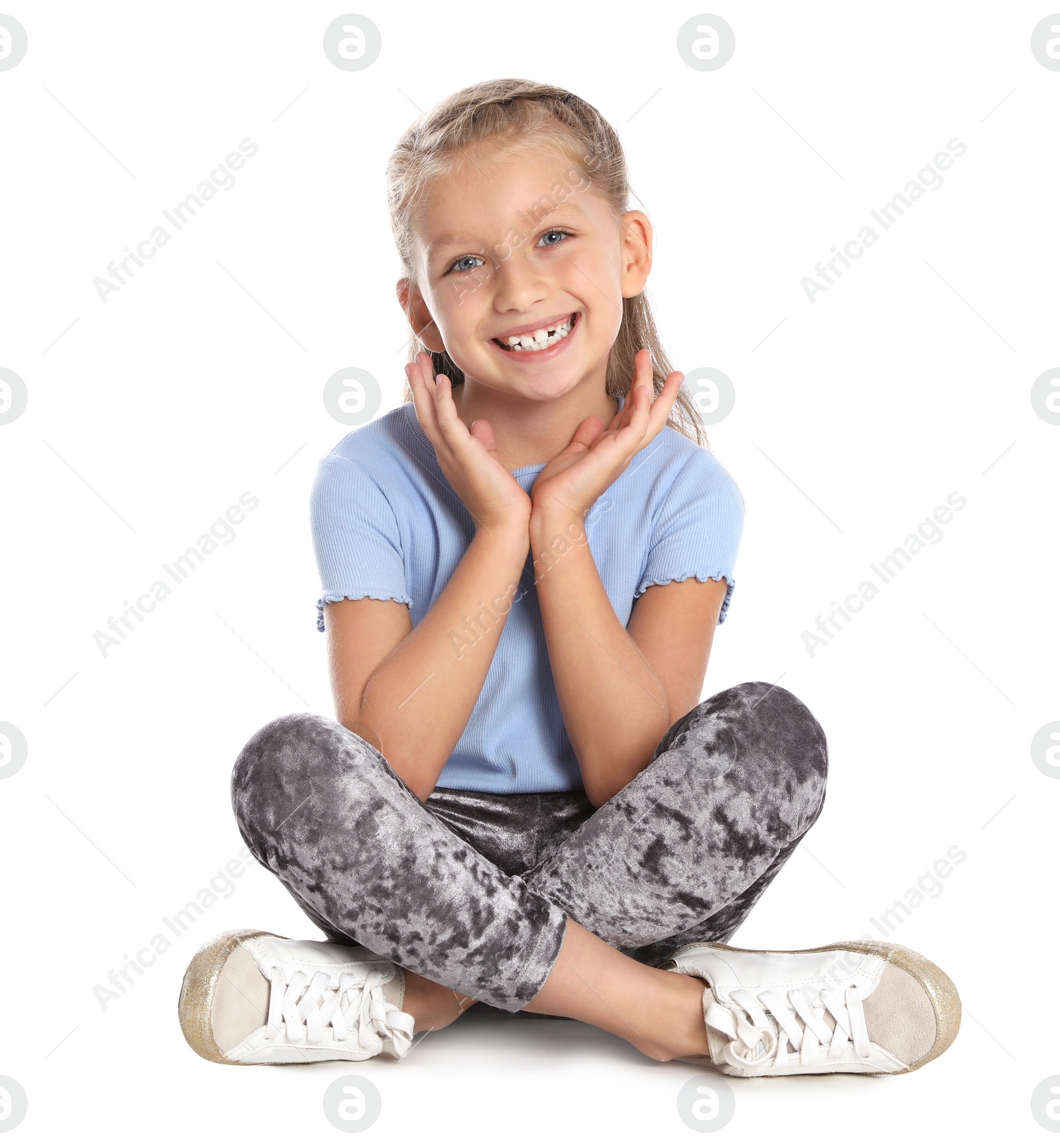 Photo of Portrait of adorable little girl on white background