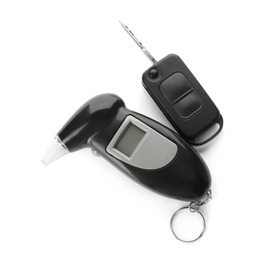 Photo of Modern breathalyzer and car key on white background, top view