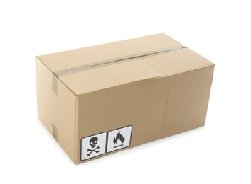 Photo of Cardboard box with different packaging symbols isolated on white. Parcel delivery