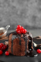 Photo of Delicious warm chocolate lava cake on plate