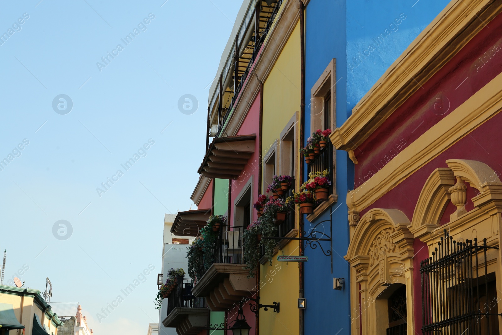 Photo of San Pedro Garza Garcia, Mexico - September 25, 2022: Beautiful colorful buildings on city street