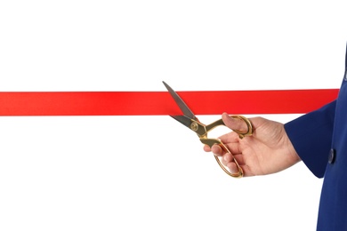 Photo of Man in office suit cutting red ribbon isolated on white, closeup