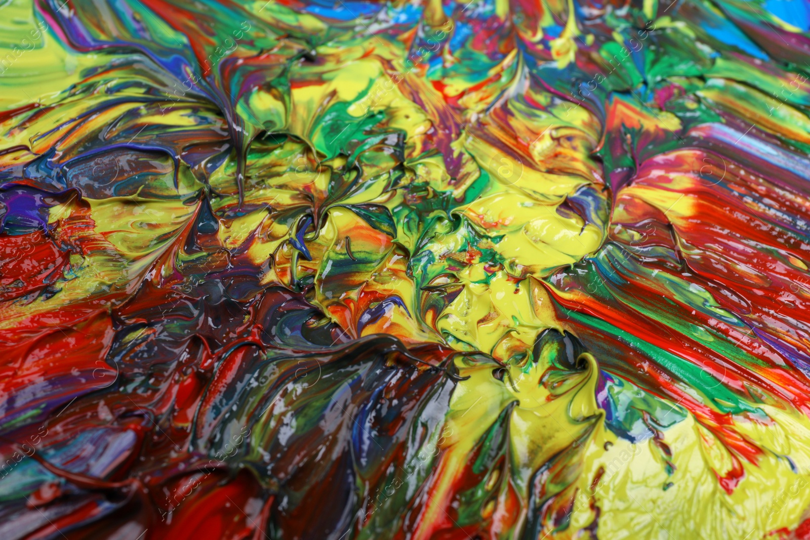 Photo of Abstract colorful acrylic paint as background, closeup view