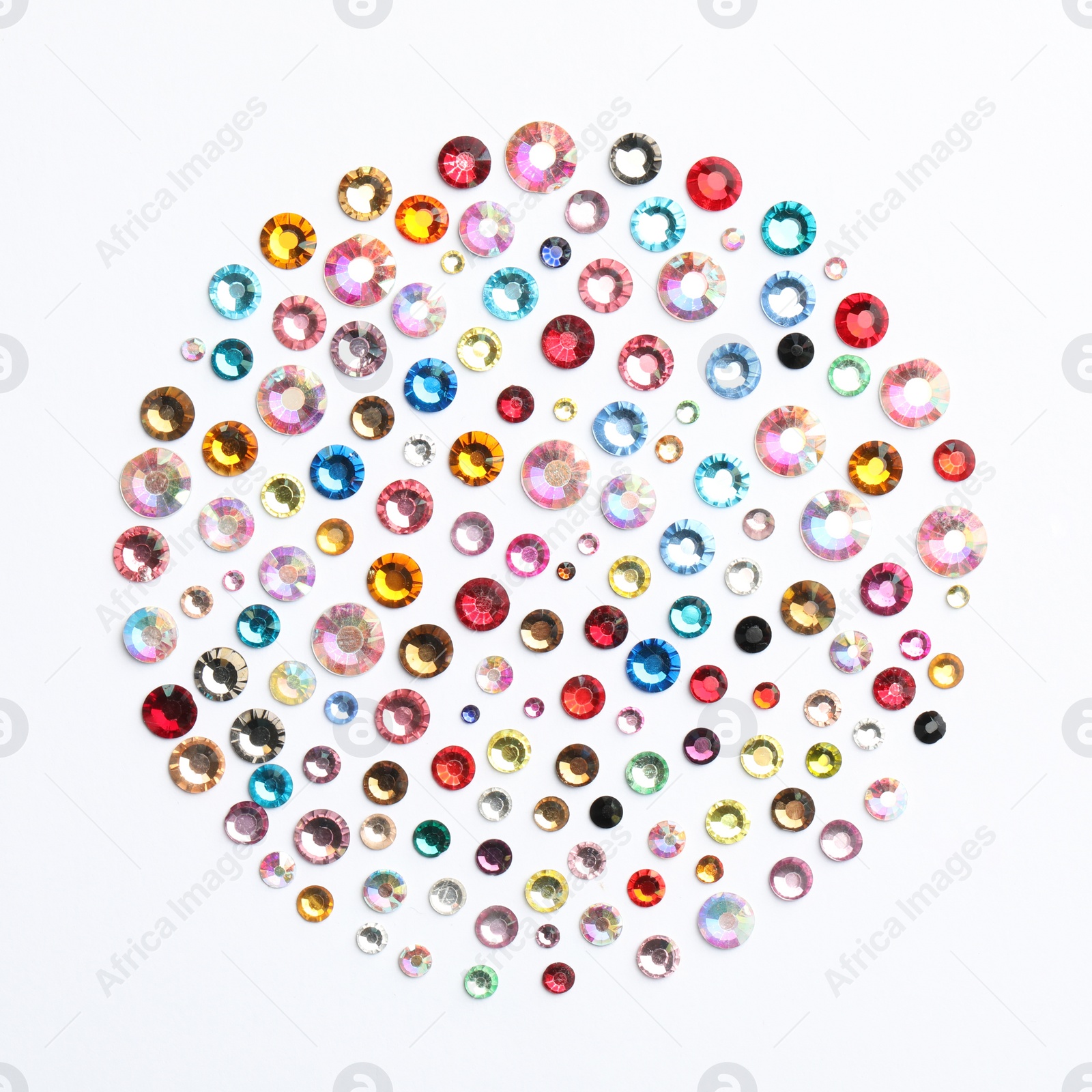 Image of Different beautiful gemstones on white background, top view