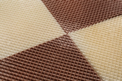 Tasty wafers as background, closeup. Crispy food