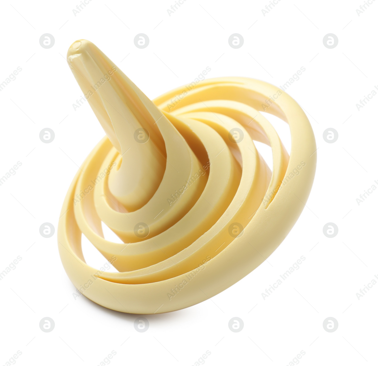 Photo of One pale yellow spinning top on white background