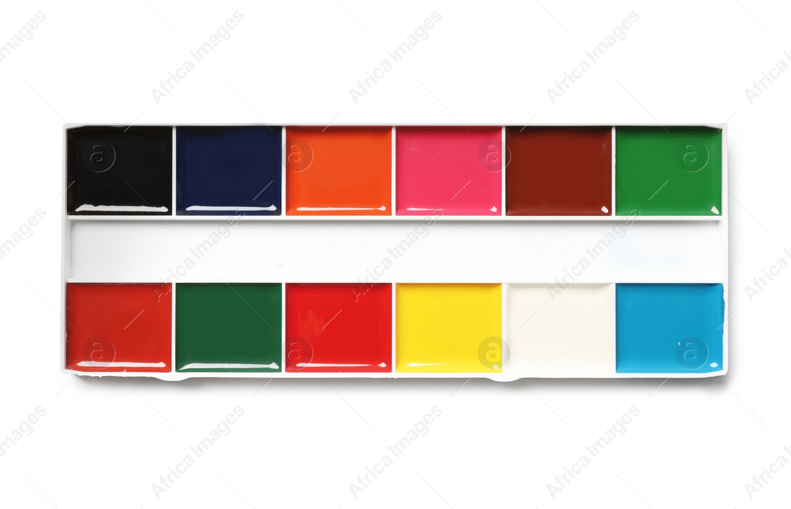 Photo of Plastic watercolor palette on white background, top view. Painting equipment for children