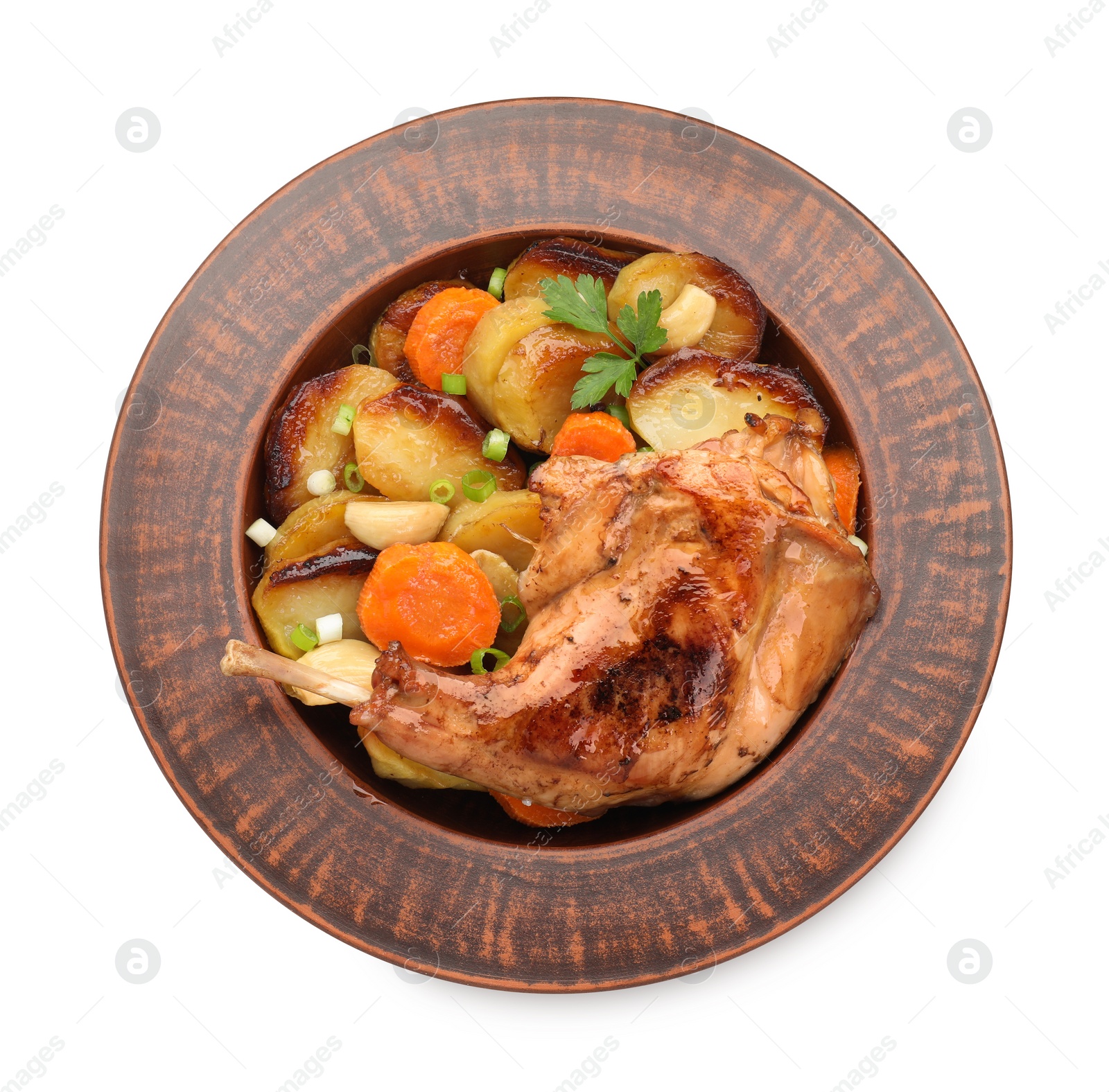 Photo of Tasty cooked rabbit meat with vegetables isolated on white, top view