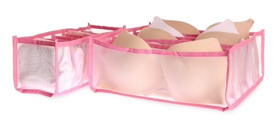 Transparent organizers with underwear on white background