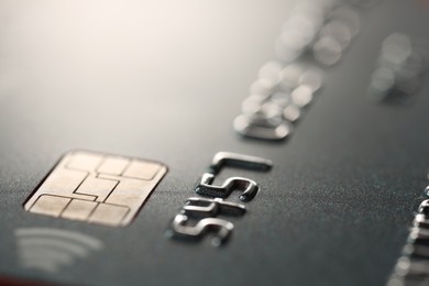 Photo of Plastic credit card as background, macro view